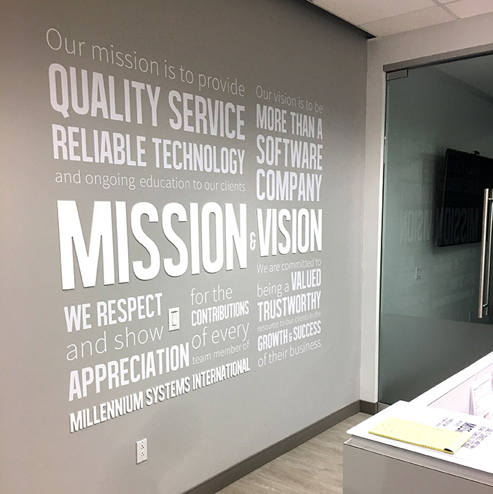 Die cut vinyl lettering and 1/4" acrylic letters used to create a "Mission Statement" in the lobby of one of our clients.